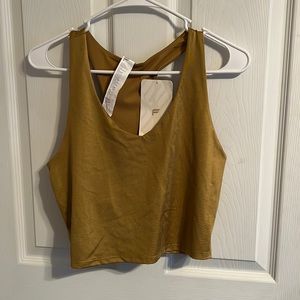 NWT gold Fabletics sports bra!!